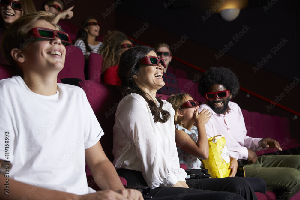 Fototapeta premium Audience In Cinema Wearing 3D Glasses Watching Comedy Film