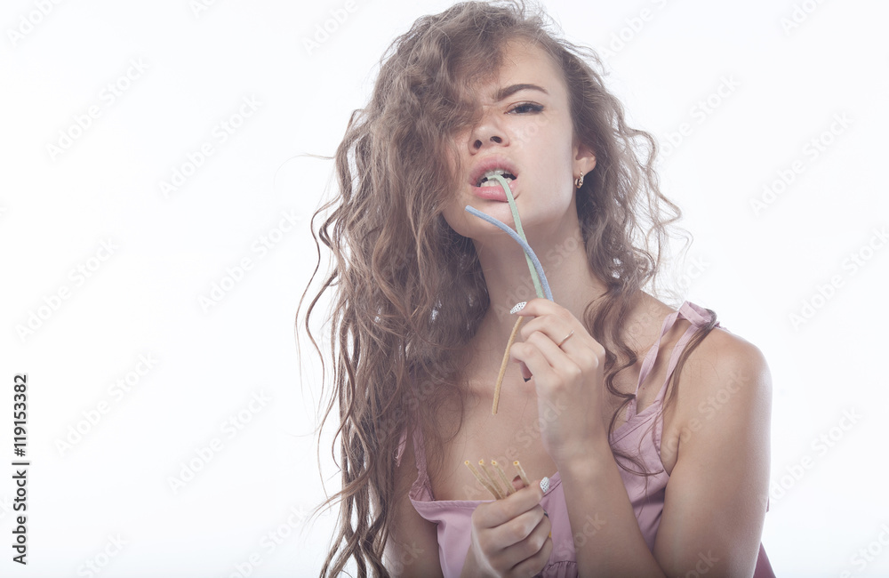Portrait of beautiful girl with candy isolated on white background Portrait of beautiful girl with candy isolated on white background