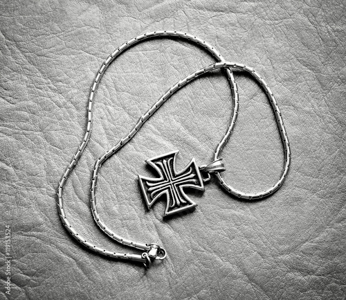 Pendant cross on a neck chain