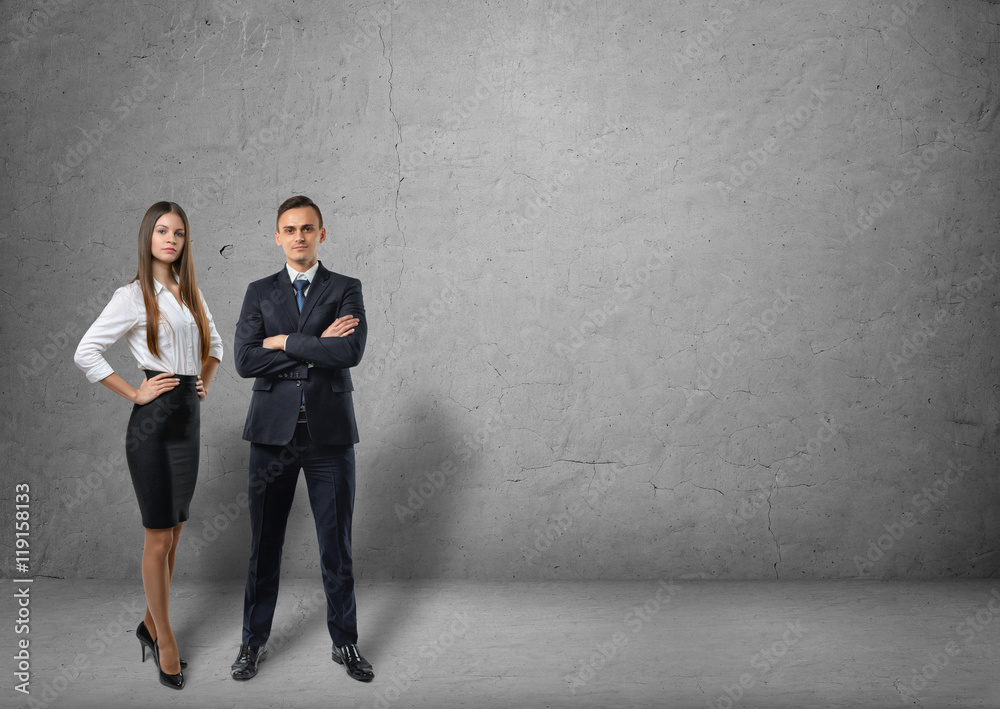 Front view of businessman and businesswoman standing Front view of businessman and businesswoman standing