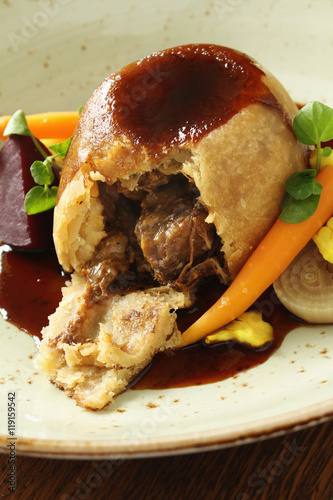 steak steamed pudding plated meal photo