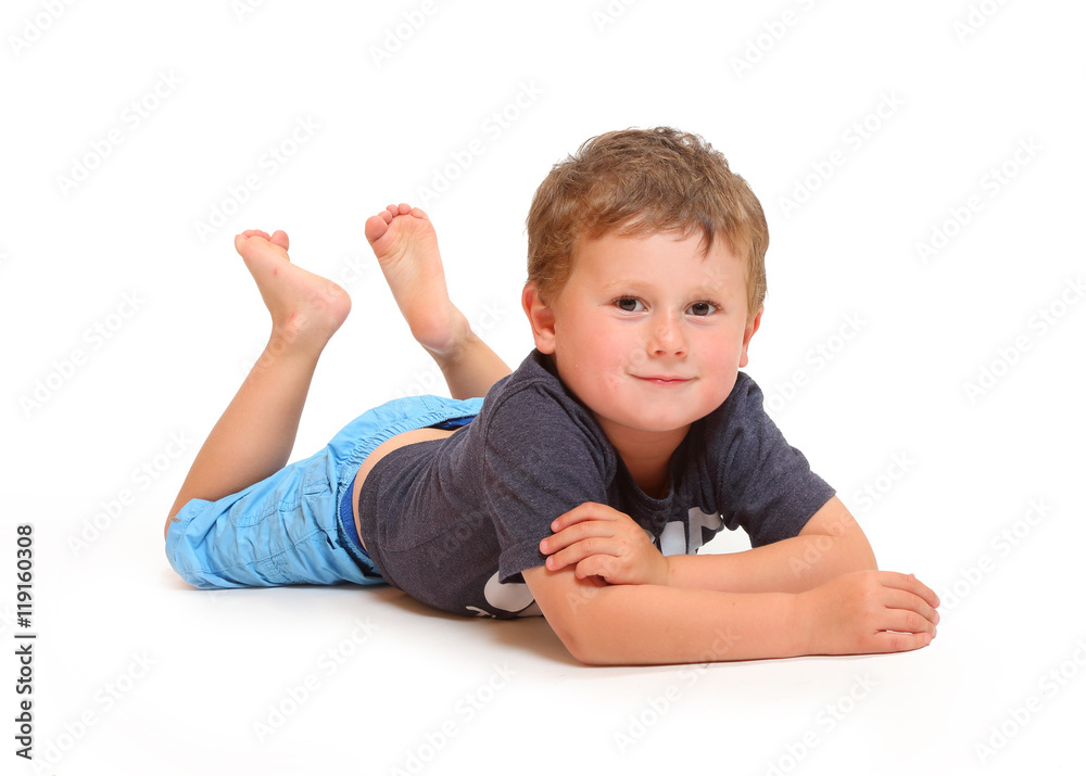Little boy relaxing. People isolated on white background. Little boy relaxing. People isolated on white background.