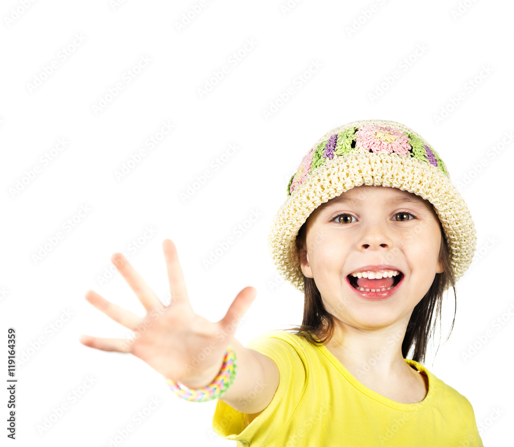 Cute little girl happily shows an open hand Cute little girl happily shows an open hand