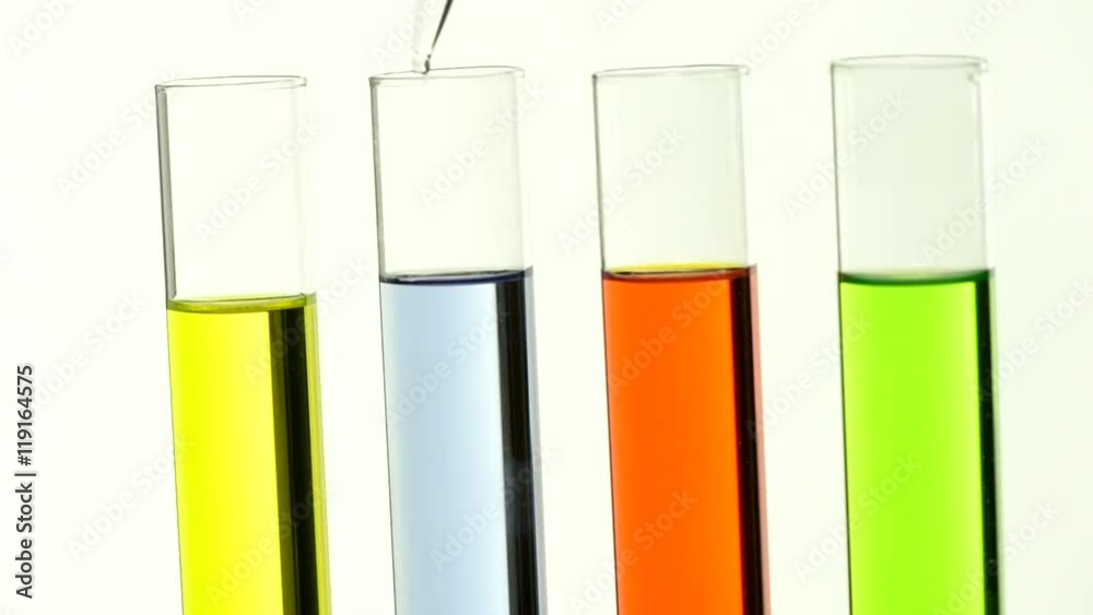 Test tubes with colored liquids abuzz Test tubes with colored liquids abuzz