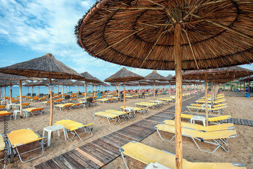 Umbrellas and chairs on the beach, in Nea Flogita - Halkidiki Gr