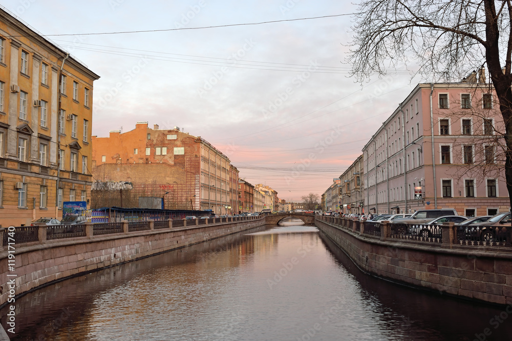 The canal during a pink sunset in St. Petersburg