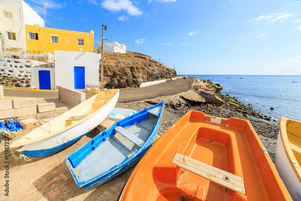 Wooden fishing boats in a small port in Greece
