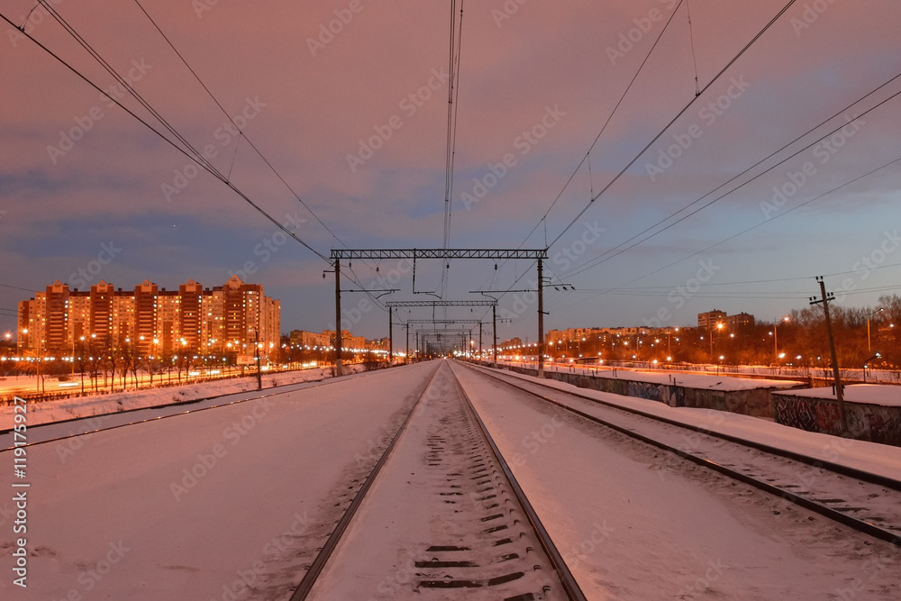 Railroad rails and wire supports in the winter