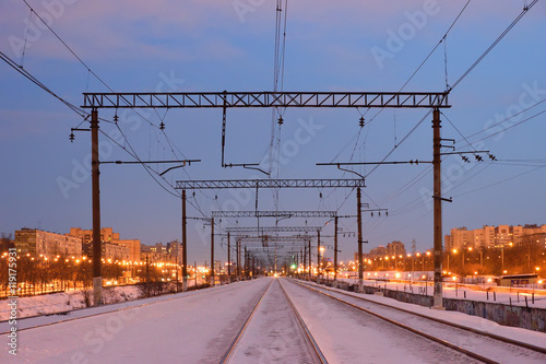 Railroad rails and wire supports in the winter