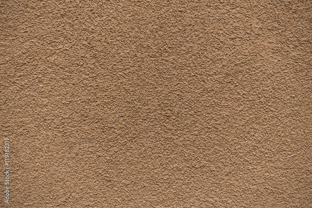 Orange revetment wall putty macro texture background Orange revetment wall putty macro texture background