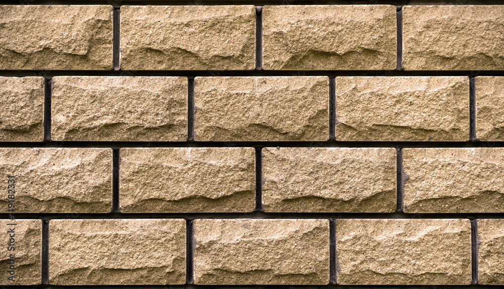 Fototapeta premium Texture of orange decorative tiles in form of brick