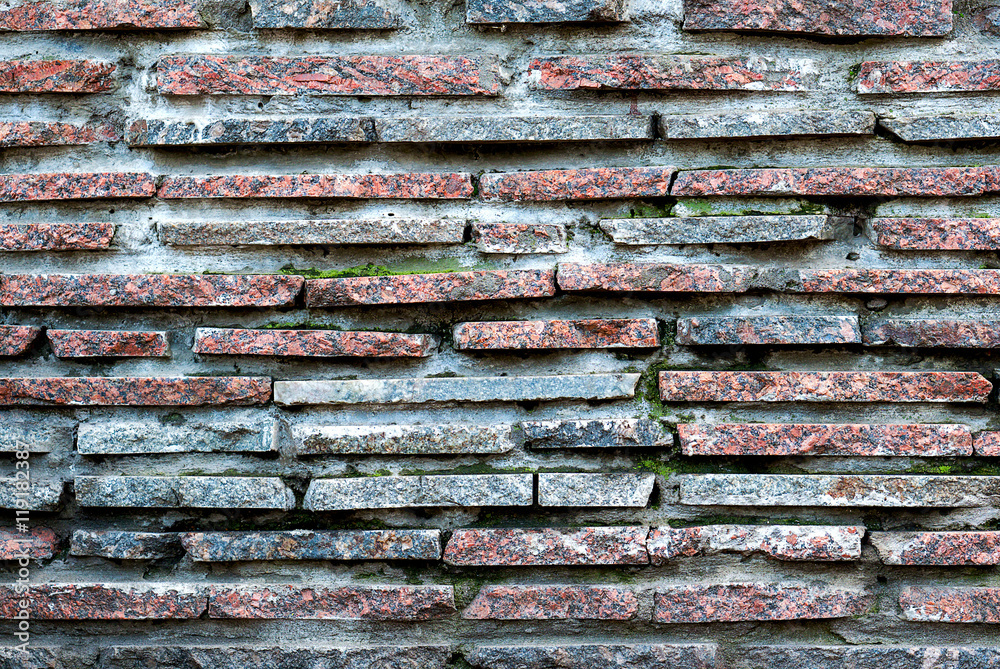 Red and blue marble stone brick wall detailed texture background cold filtered