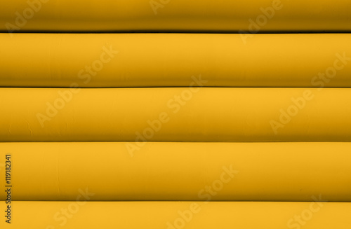 Texture of yellow inflated water mattress