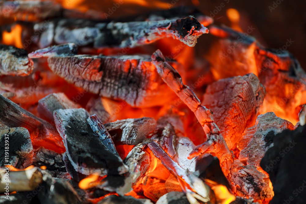 Glowing coals in a barbeque coal fire smoke Glowing coals in a barbeque coal fire smoke