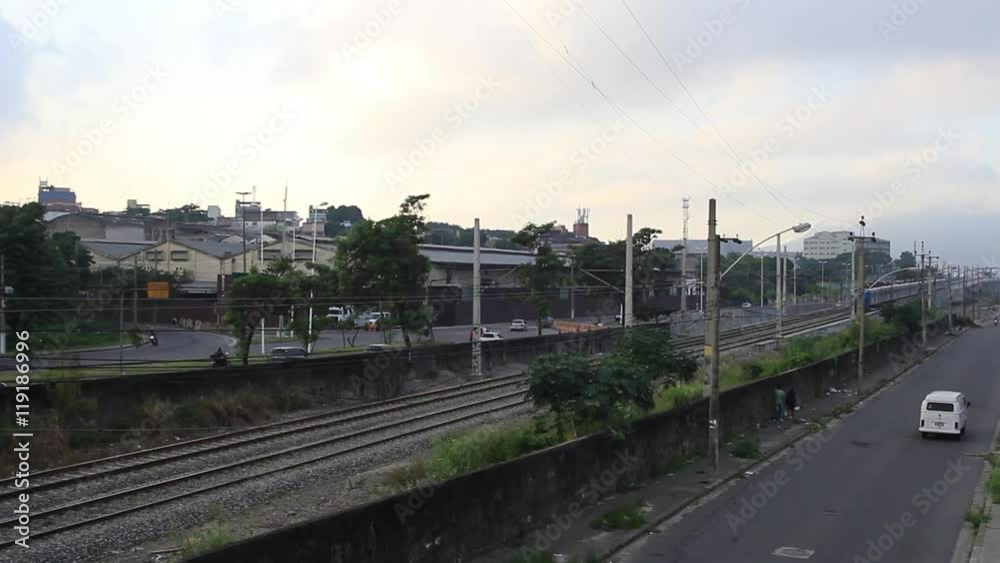A train passes by an industrial area in Brazil A train passes by an industrial area in Brazil