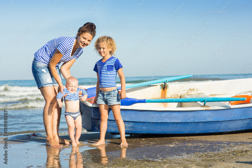 Fototapeta premium Woman with two children