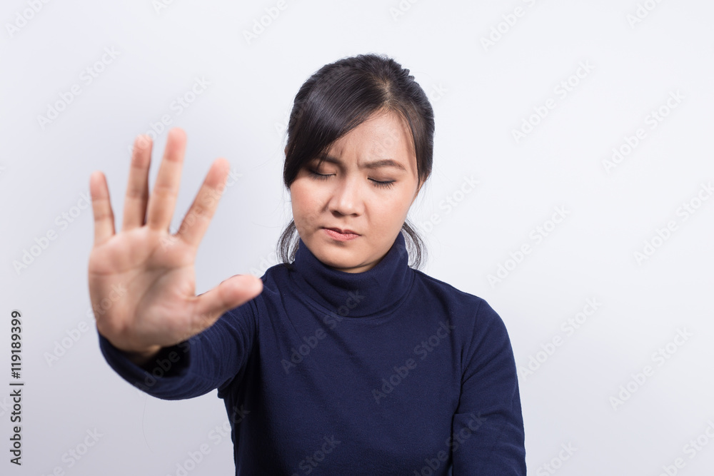 Emotional Portrait: Angry woman and show her hand stop symbol Emotional Portrait: Angry woman and show her hand stop symbol