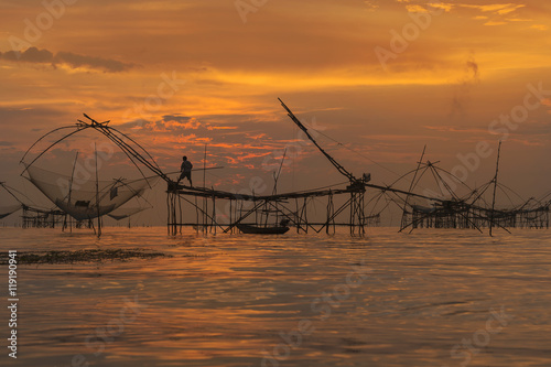 Fisherman Catching Fish From Fish lift net in Pak Pra Canel, Pha
