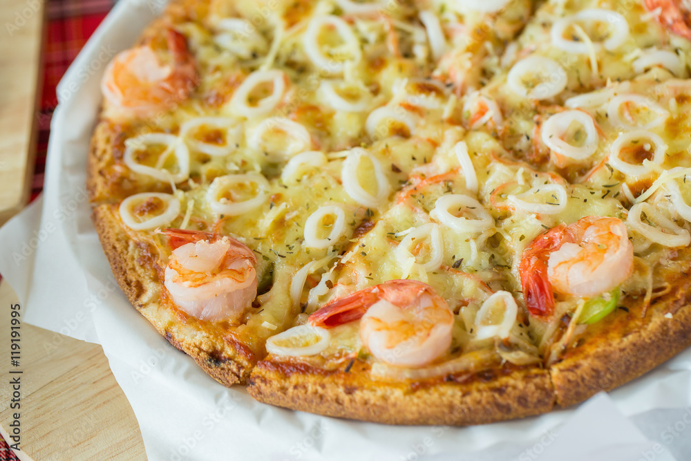Delicious pizza with seafood