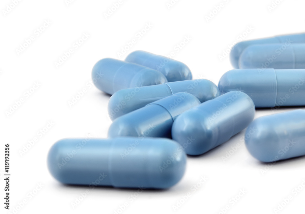 Medical pills on a white background close up. Medical pills on a white background close up.