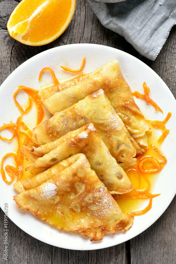 Crepes with orange syrup, top view Crepes with orange syrup, top view
