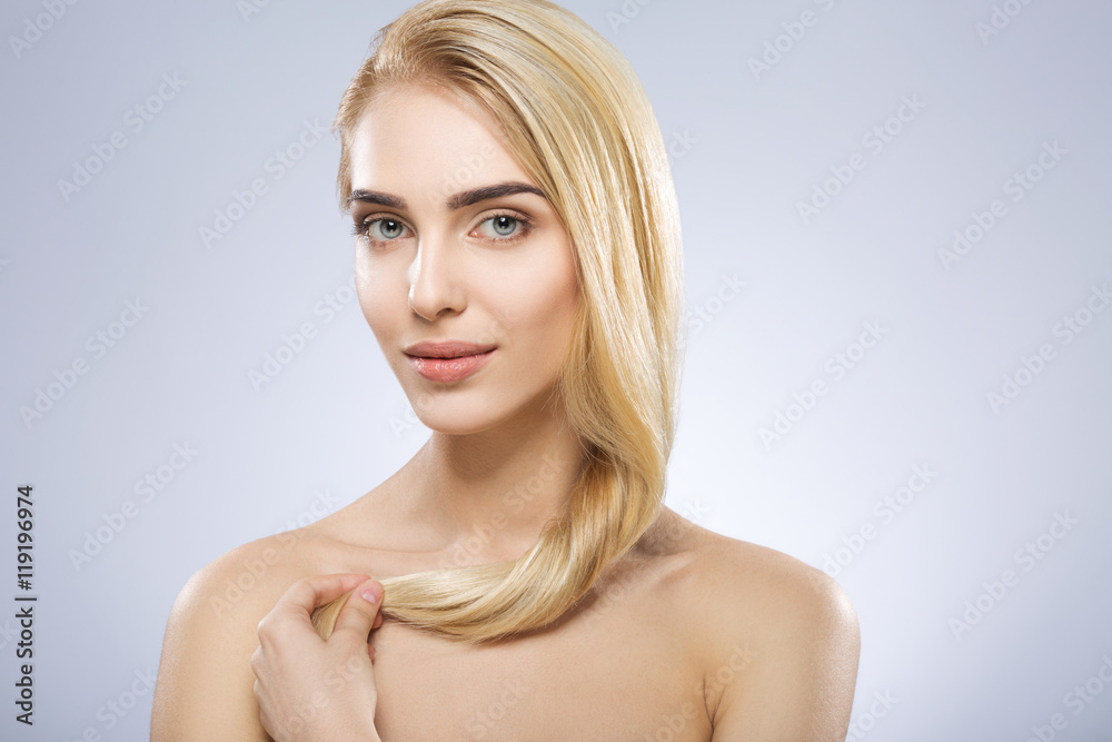 Beautiful girl with nude make up at studio Beautiful girl with nude make up at studio