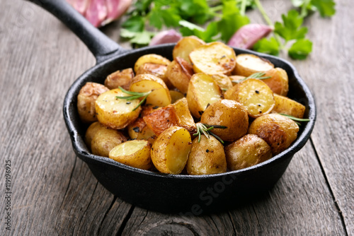 Fried potato in frying pan