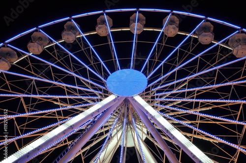 Spinning ferris wheel at night light