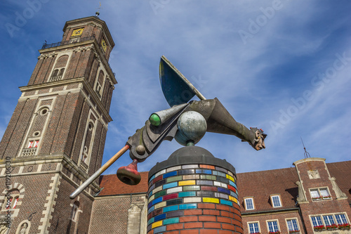 Sculpture and church tower in Coesfeld photo