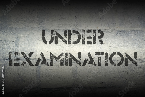 under examination gr