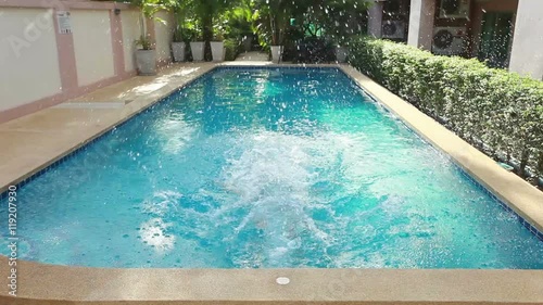 Wallpaper Mural Woman falling down to swimming pool with splashes Torontodigital.ca