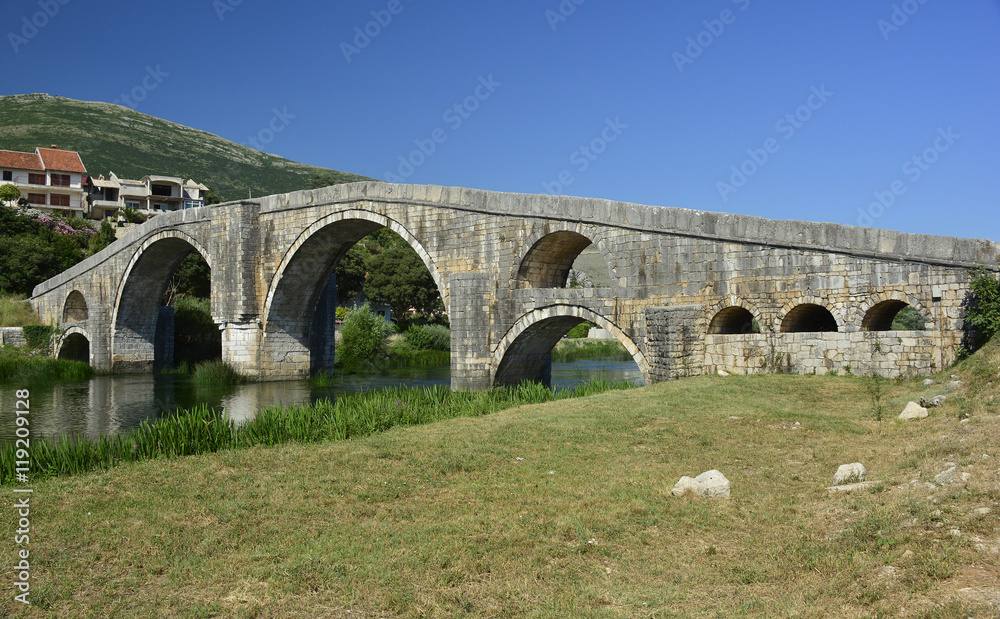 Arslanagica Most over Trebisnjica River in Trebinje, Bosnia, also known since 1993 as Perovica Bridge. Built by Ottomans in 1574, 
