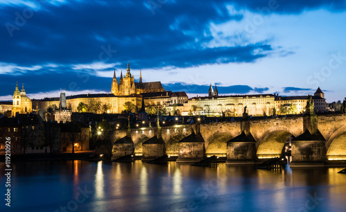 Prague Castle with charle's bridge in twilight with dramatic sky