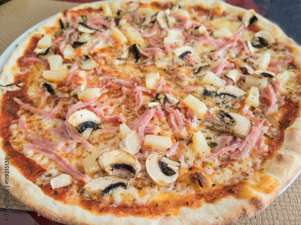 Pizza with ham, pineapple, mushroom topping Pizza with ham, pineapple, mushroom topping