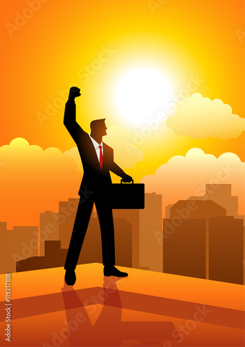 Businessman standing on the edge of a building