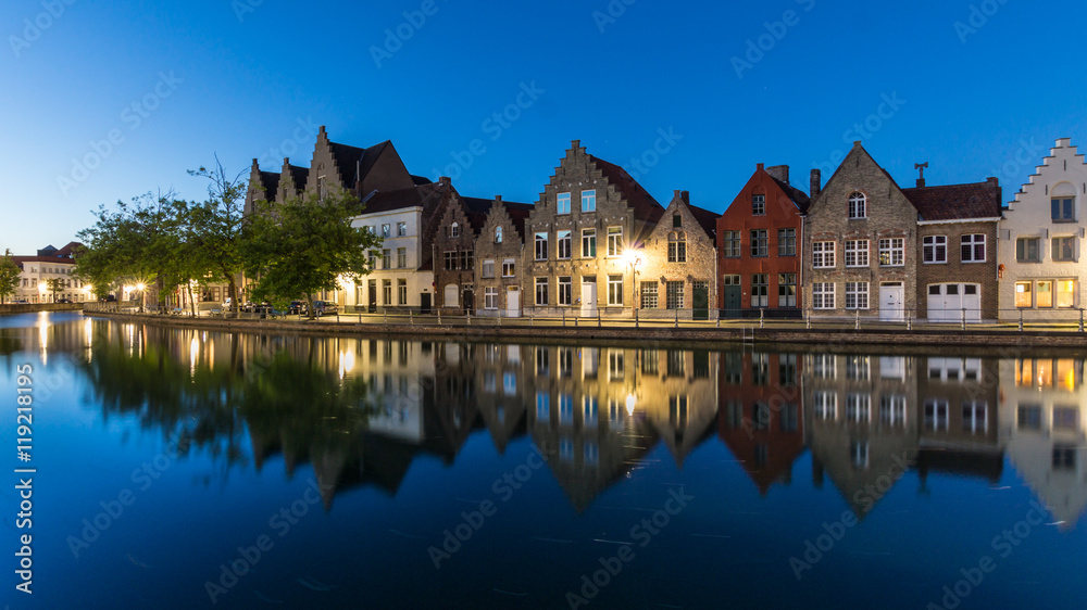Typical row of houses along a channel in Bruges - Belgium