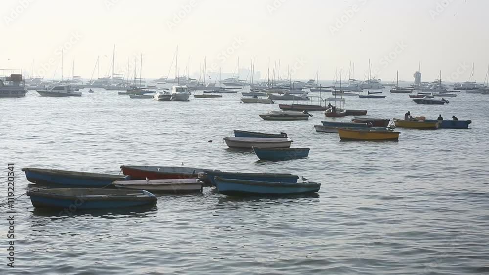 Tourist and fisher boats by the harbour Tourist and fisher boats by the harbour