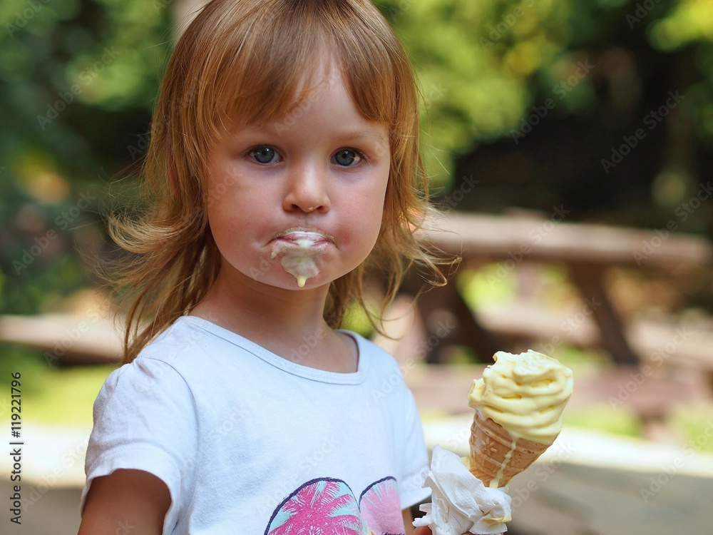 Little Blond Girl Eating Ice Cream She Is Dirty And The Ice Cream Is little-blond-girl-eating-ice-cream-she-is-dirty-and-the-ice-cream-is