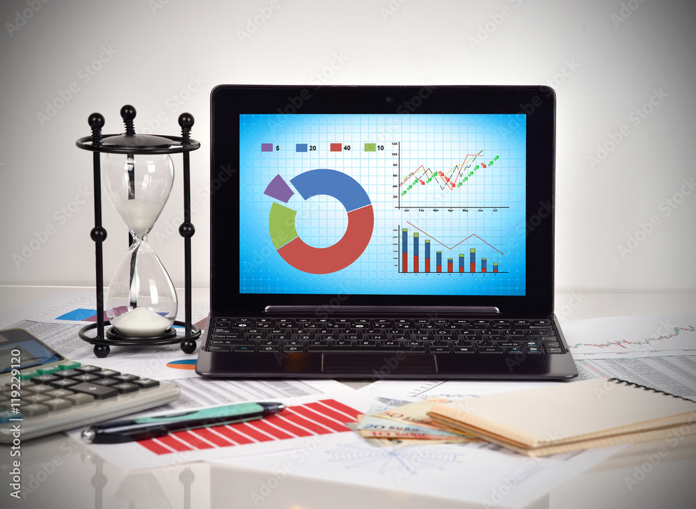 Stock chart on screen laptop Stock chart on screen laptop
