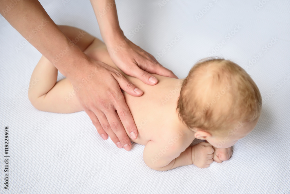 Loving mother caring for her baby girl