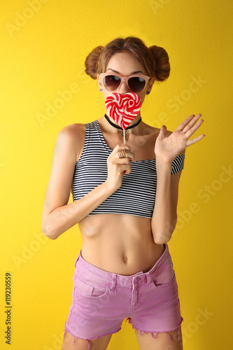 Beautiful girl with candy o...