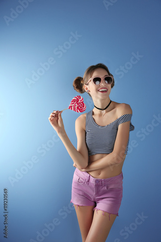 Beautiful girl with candy o...
