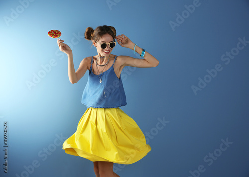 Beautiful girl with candy o...