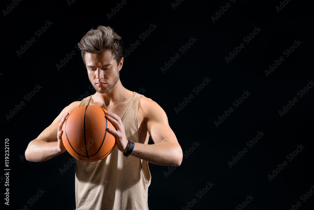 Skillful basketball player ready for competition Skillful basketball player ready for competition