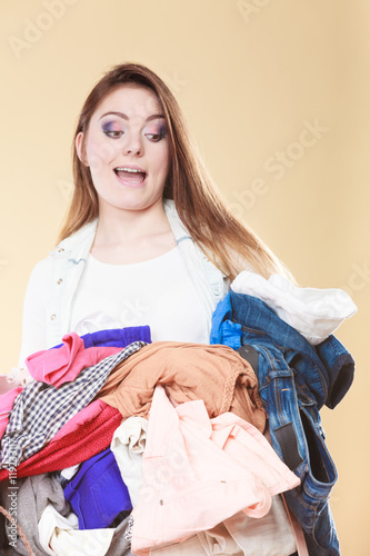Woman with dirty laundry clothes.