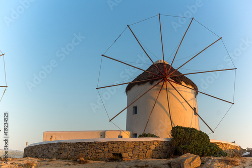 Sunset over White windmills on the island of Mykonos, Cyclades, Greece