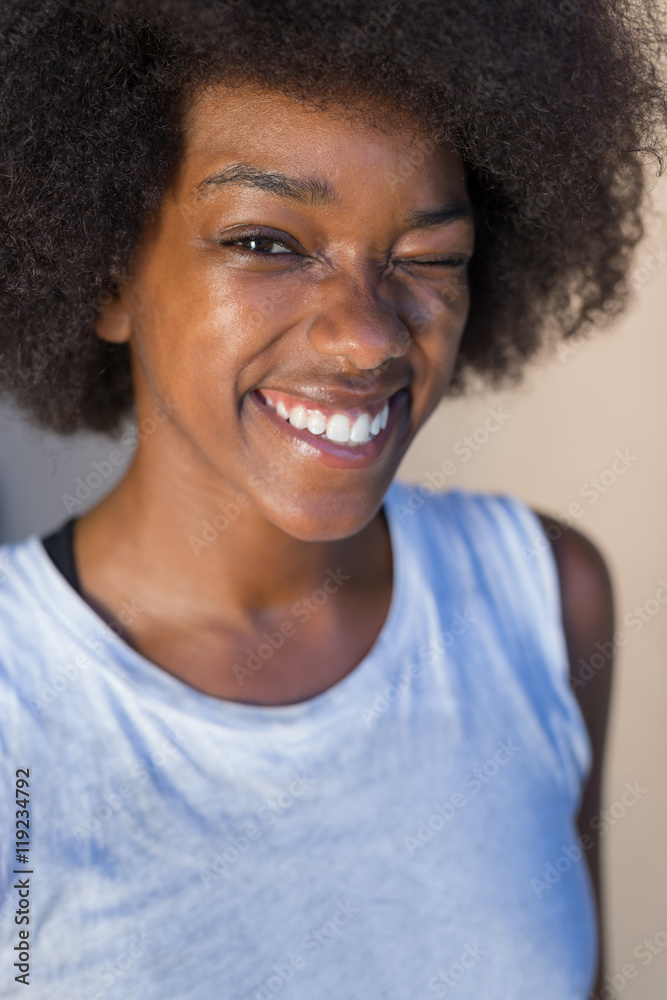 Beautiful young African woman smiling. Beautiful young African woman smiling.