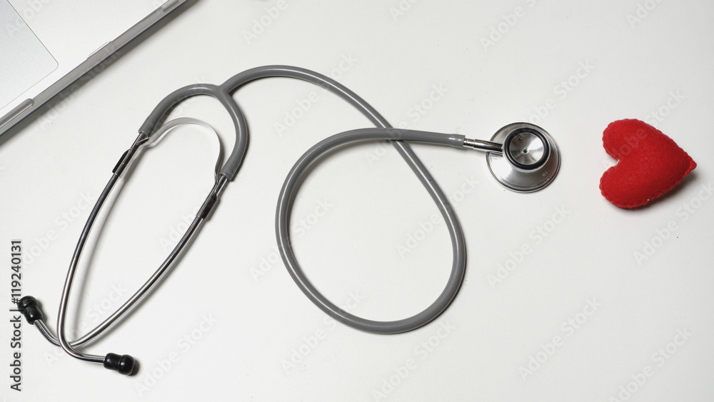 Workplace doctors with notepad and keyboard, and stethoscope Workplace doctors with notepad and keyboard, and stethoscope