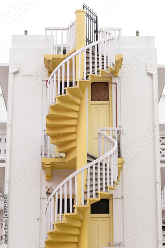 Photography Colorful spiral staircases at the back of traditional Chinese shop houses in Bugis area, Singapore