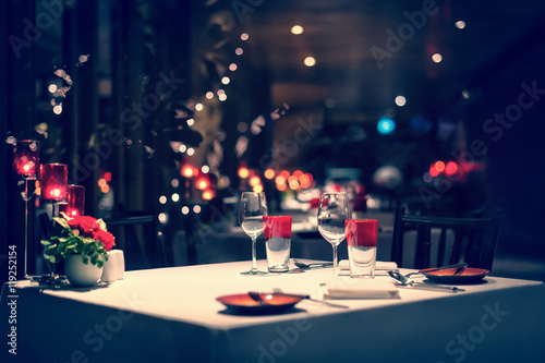 romantic dinner setup, red decorations. Vintage.